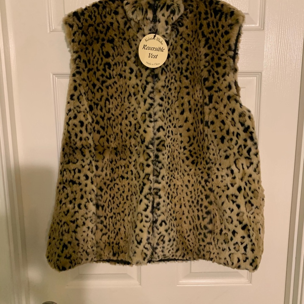 Reversible faux fur vest.